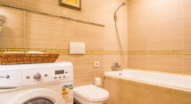 Люкс Executive Qingdao Jinshan We+ Holiday Apartment (Wusi Square)