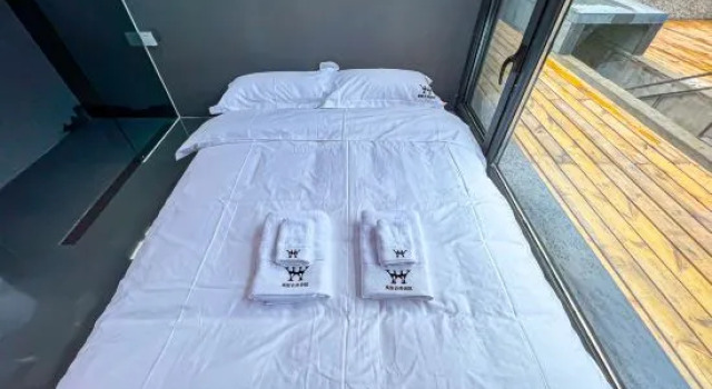 Кровать в общем номере Wanshenggu ART Homestay, Beijing