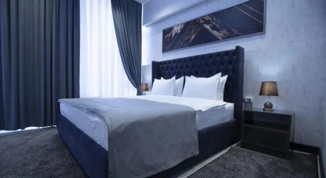 Номер Deluxe Oqsaroy Hotel