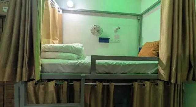 Кровать в общем номере Taj Street Hostel