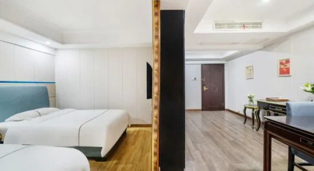 Двухместный люкс Deluxe Zhonggang Holiday Hotel