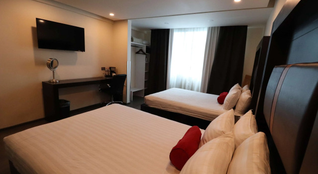 Четырёхместный люкс Best Western Plus Metepec & Suites