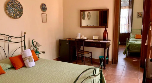 Четырёхместный номер Standard с видом на сад B&B Villa Vittoria