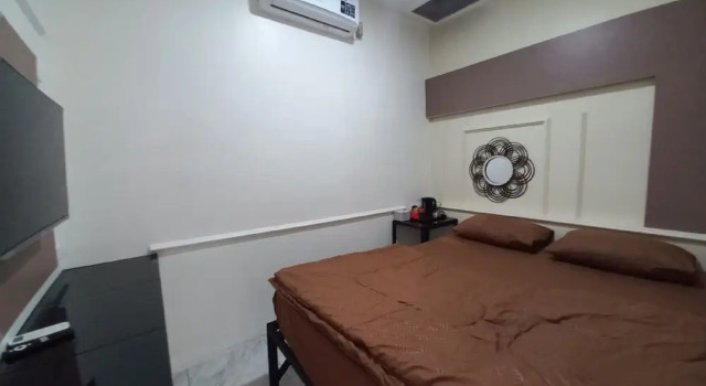 Camera Deluxe OYO 93962 Jm Guest House