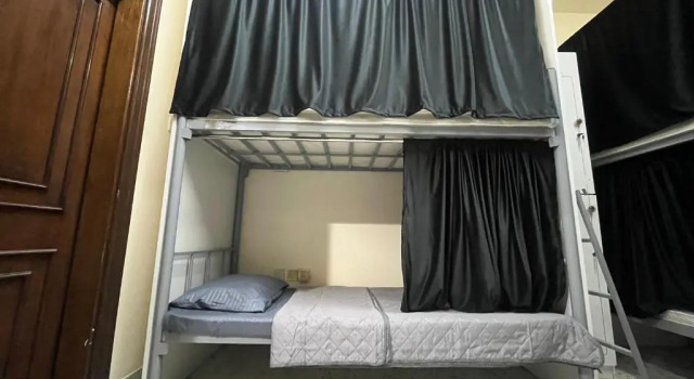 Кровать в общем номере Paradiso Backpackers Haven