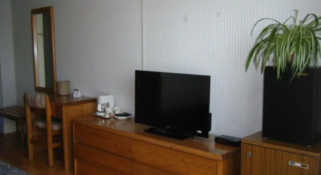 Четырёхместный номер Standard Claymore Inn and Suites