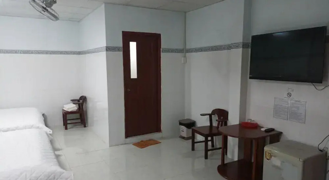 Кровать в общем номере Hai Hien Guesthouse