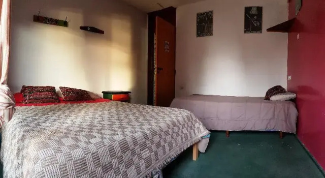 Кровать в общем номере La Casona Hostel
