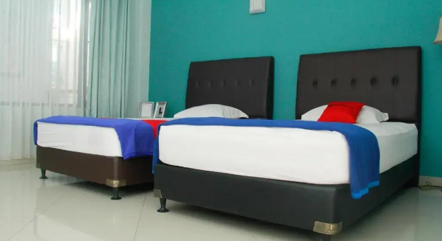 Standard Twin room RedDoorz Plus at Palagan Joglo Sersan Bajuri