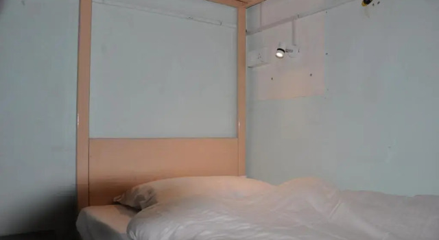 Кровать в общем номере Ganga Fuji Home