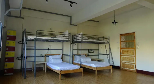 Кровать в общем номере Chiayi Petite Hostel