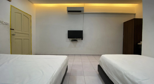 Трёхместный люкс Hotel O Taman Kota Homestay