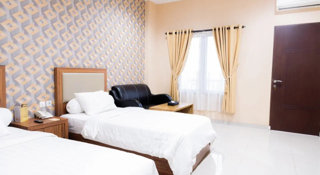 Номер Deluxe Grand Central Medan