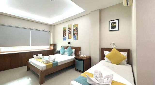 Standardowy rodzinny pokój 1 sypialnia Sunburn Suites Coron