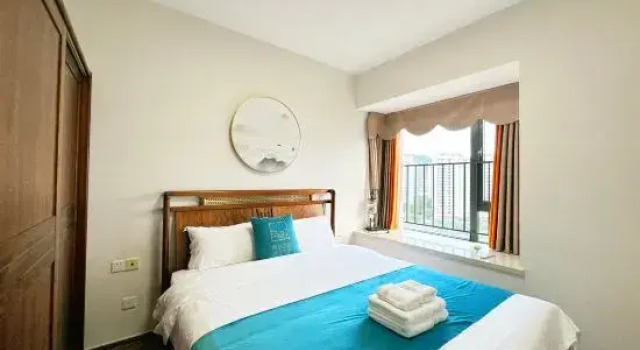Семейный люкс с 3 комнатами Qinhai Hotel Apartment(Nanshan Temple Yazhou Bay Science and Technology City Store)
