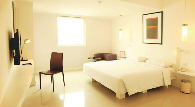 Номер Deluxe Hotel Glodok Plaza