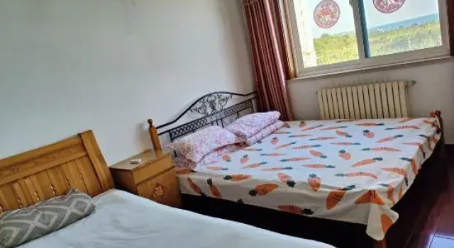 Люкс с 3 комнатами с видом на море Yijia B&B (Qingdao Jinshatan Branch)