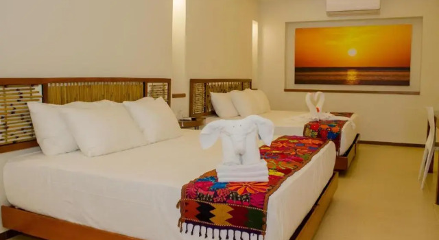 Четырёхместные апартаменты с частичным видом на море Hotel Azul Maya