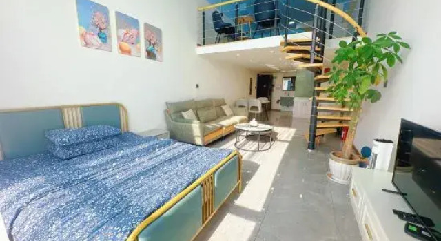 Двухместный семейный люкс Yijiu Apartment (Kunming Railway Station Shuangqiao Night Market Style Street)