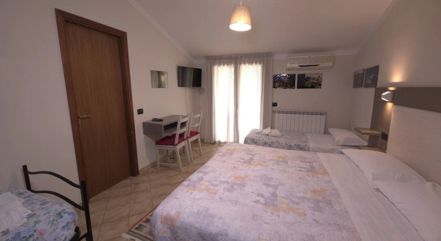 Четырёхместный номер Standard Albergo Lago Verde