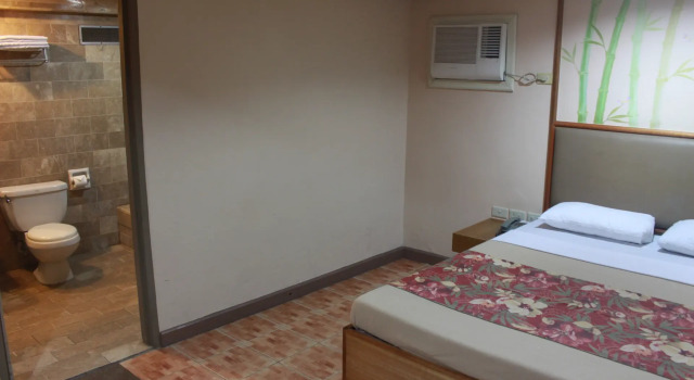 Номер Deluxe Pinoy Pamilya Hotel