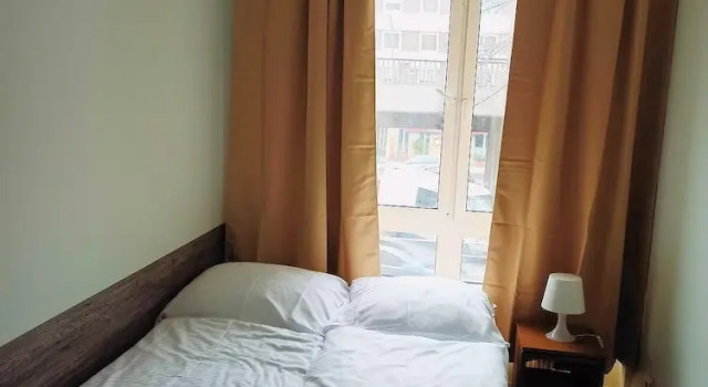Кровать в общем номере Puschkin Rooms