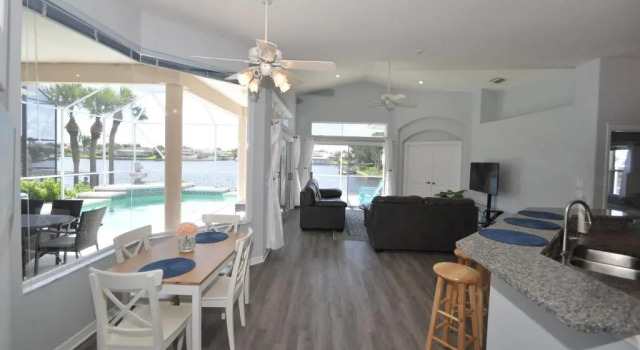Sunset Bay Beautiful Pool Home - Bring Your Boat or Jet Ski - Canal with Dock- Sleeps 10 - 4 BD, Book Hotel Palm Coast Florida