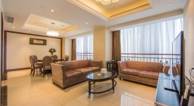 Qingdao Center Hotel and Apartment, Prenota Appartamento Qingdao 