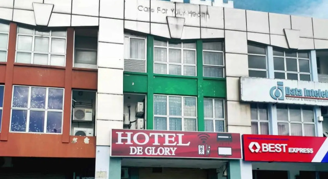 Кровать в общем номере De Glory Hotel USJ 21