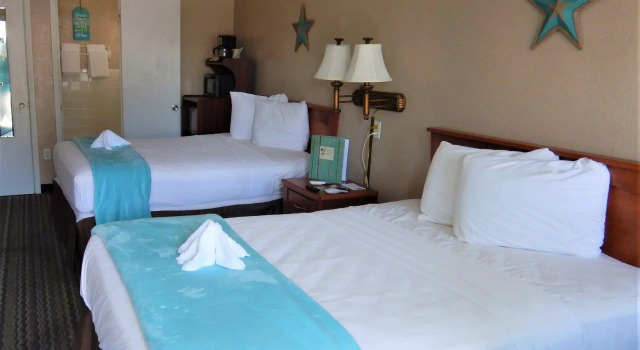 Tropic Island Resort, Забронировать Курортный отель Порт-Аранзас Mustang Island, рядом с Художественный центр Порт-Аранзаса