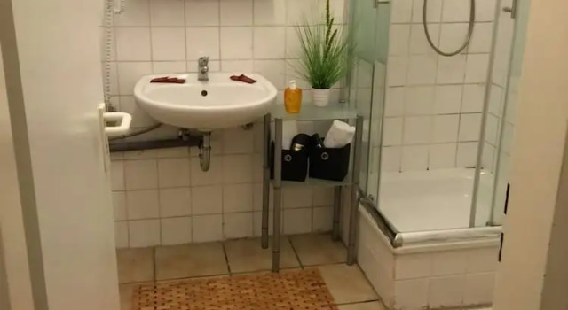 Кровать в общем номере Hotel Drei Kronen
