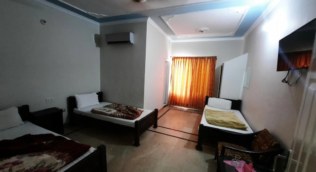 Трёхместный номер Standard Islamabad Guest House