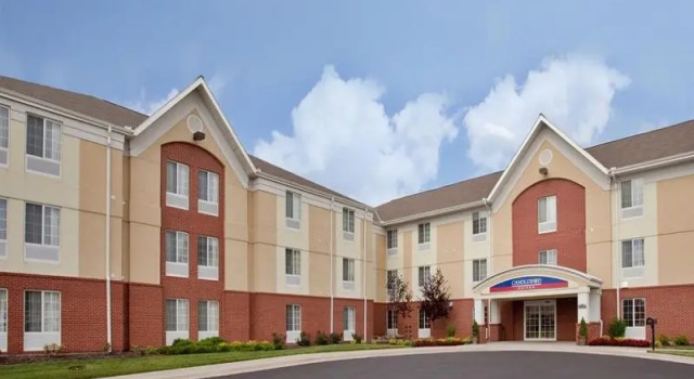 Кровать в общем номере Candlewood Suites Kansas City by IHG