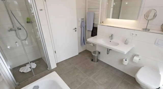 Апартаменты Haus "Jasmund" F 646 WG 01 im EG mit Kamin und Terrasse