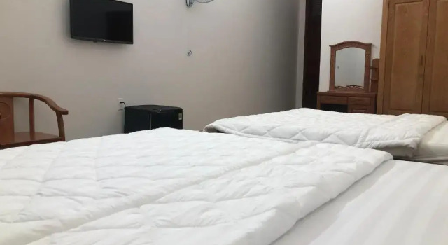 Четырёхместный номер Deluxe Khách sạn Nguyên Long