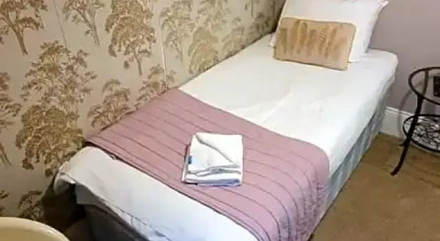 Трёхместный семейный люкс Deluxe Guestling Hall Hotel