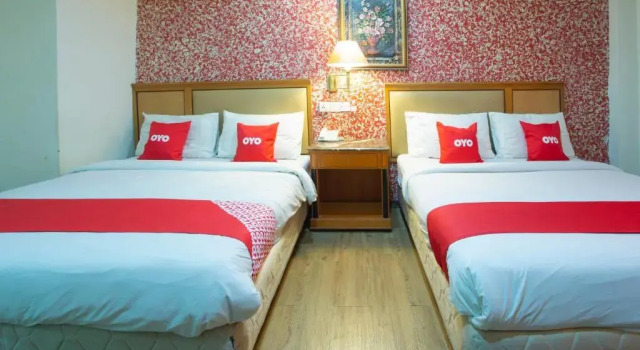Люкс Capital O Hotel Grand Orchard