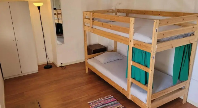Postel ve společném pokoji pro ženy inBraga Hostel
