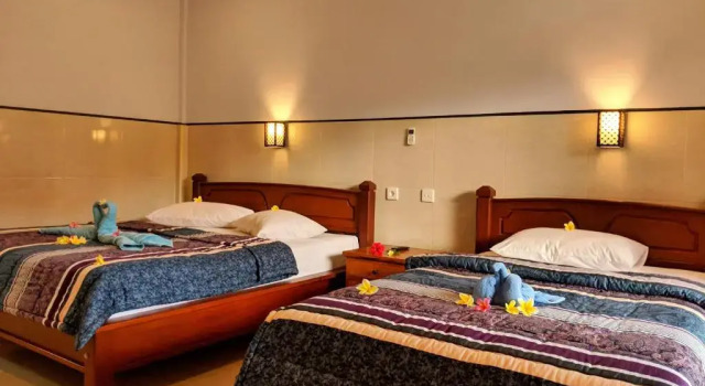 Трёхместный номер Deluxe с балконом и с видом на бассейн Serangan Inn Mimba