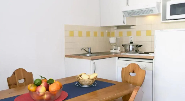 Кровать в общем номере Résidence Odalys Soleil dAure