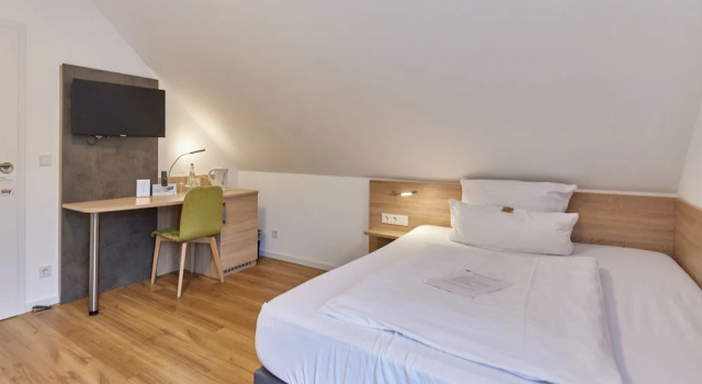 Номер Deluxe Moselhotel Weinhaus Simon `Sauna`Winzerstube`ELadesäule