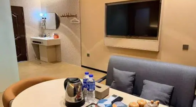 Семейный люкс Mile Taifeng Building Hotel (Giant Century Plaza Qinglai Park Branch)