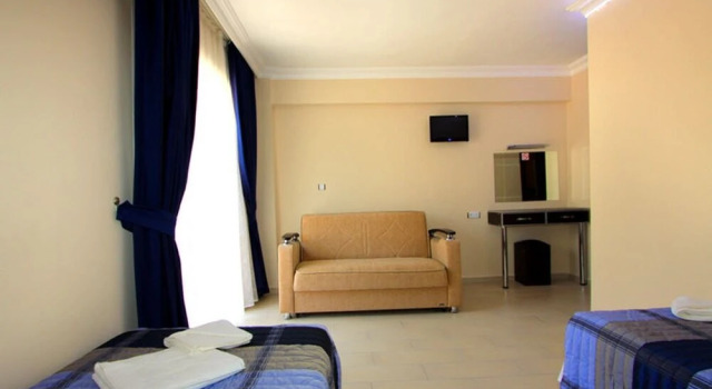 Standardowy trzyosobowy pokój Aristo Otel