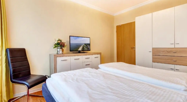 Апартаменты Am Schloonsee Haus D - Apartments mit Strandkorb
