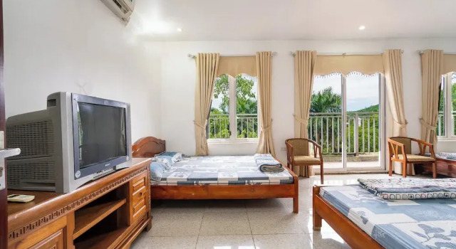 Кровать в общем номере с видом на сад Lumiere Family Retreat & Villas Ba Vi Hà Noi