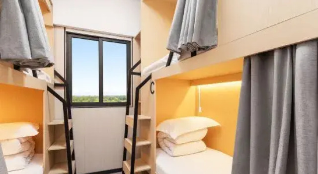 Кровать в общем номере (женский номер) XingDu International Hostel Apartment(Jiang Nan XI And Chang Gang Railway Station)