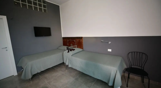 Deluxe quadruple chambre avec balcon et Vue piscine Inkantu B&B