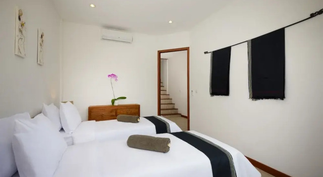 2 soveværelser i Deluxe over to etager værelse med udsigt over poolen Echo Beach Villa
