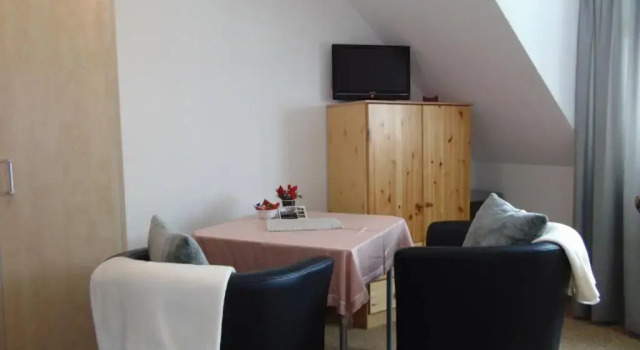 Апартаменты Am Kirchberg Ferienwohnungen