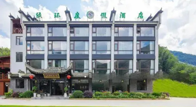 Кровать в общем номере с 6 комнатами с красивым видом из окна Lühuan Vacation Apartment (Jing Shuimo Tingxi)